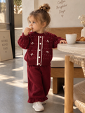 The classic button-down front makes layering quick and effortless, preventing the fuss of pulling tightly fitted sweaters over a toddler’s head