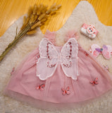 This Summer Baby Girl Fairy Dress With Hair Band Is Adotable Pink with butterfly Wings, Mesh Sleeves And a Flared Hem for a Perfect Birthday Party Or Celebration .