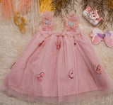 This Summer Baby Girl Fairy Dress With Hair Band Is Adotable Pink with butterfly Wings, Mesh Sleeves And a Flared Hem for a Perfect Birthday Party Or Celebration .