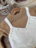 The Texture: Ultra-plush, non-shedding, cloud-soft fuzzy knit.The Details: Pearl & rhinestone collar embellishments, elegant ruffle borders, layered look.Best For: Birthday parties, winter festivities, and high-end family portraits.