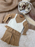 The Texture: Ultra-plush, non-shedding, cloud-soft fuzzy knit.The Details: Pearl & rhinestone collar embellishments, elegant ruffle borders, layered look.Best For: Birthday parties, winter festivities, and high-end family portraits.