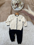 Fabric: Premium Soft Acrylic-Cotton Blend (Completely itch-free and gentle on skin)Items Included: Scallop-Edge Button Cardigan, Matching Black Knit Trousers