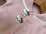 Pastel Pink / Soft Powder Pink ream White Trimming along the collar, hem, and cuffs