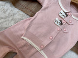 Pastel Pink / Soft Powder Pink ream White Trimming along the collar, hem, and cuffs