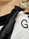 Premium velvet-touch bomber jacket featuring monogram "GD" designer pattern panels on the shoulders and collar.
