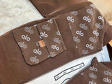 Rich Chocolate Brown / Earthy Espresso Premium smooth utility bomber jacket featuring elegant "alo" monogram luxury patterns on the front panels and collar.